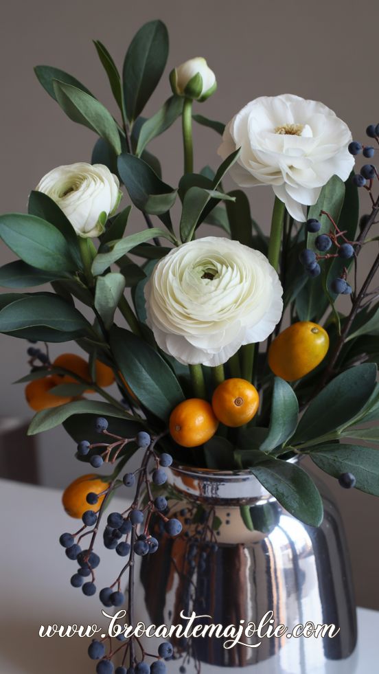 Simple White Ranunculus Winter Bouquet with Citrus Touches