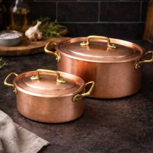 Antique French copper casserole set with lids, heavy tinned copper and riveted brass handles