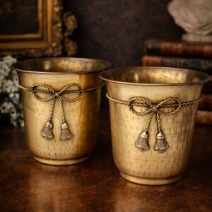 Vintage brass and gold planter set of two with decorative bow detail and aged patina