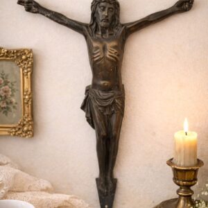 Vintage metal crucifix wall sculpture with dark bronze patina