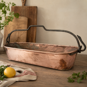 Antique copper fish poacher planter with forged iron handle and rustic aged patina for French country decor