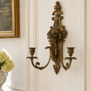 Antique French bronze wall candle sconces with ornate decorative details