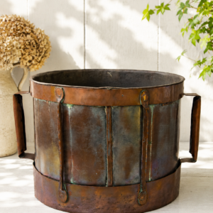 Antique French copper Ferrat water bucket with rustic patina and handcrafted shape