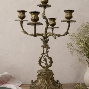 Vintage French 5 arm brass candelabra with ornate Rococo details and original drip pans on decorative base