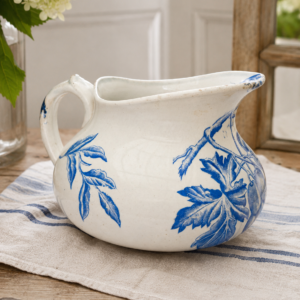 Vintage French blue and white ceramic pitcher with grape vine design