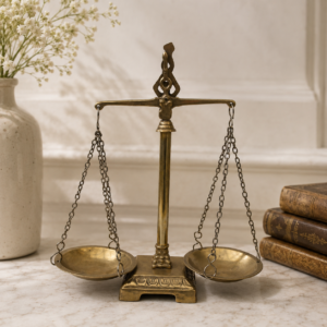 Vintage French brass scales of justice with hanging balance trays and aged patina decorative detail