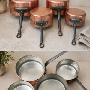 Set of 4 vintage French hammered copper saucepans with thick tin lining and dark iron handles in graduated sizes