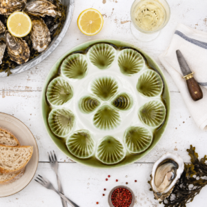 Vintage French oyster plate by Moulin des Loups Orchies in green and white ceramic with decorative oyster compartments