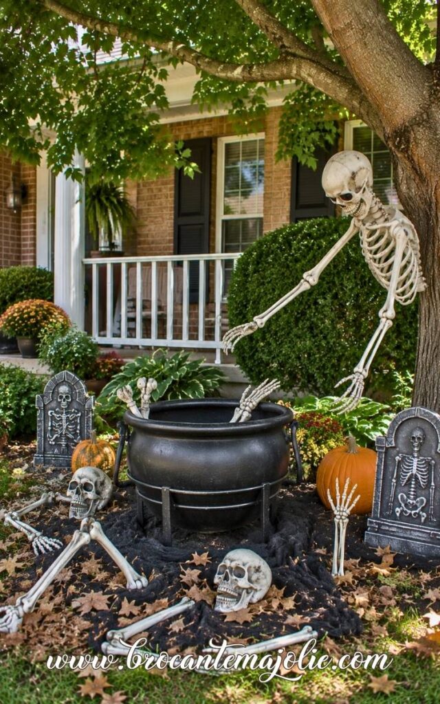 halloween yard skeleton cauldron scene