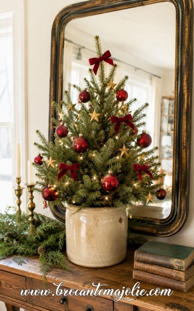 mini christmas tree on a sideboard